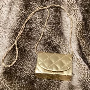 Estée Lauder Mini Gold Bag with long strap